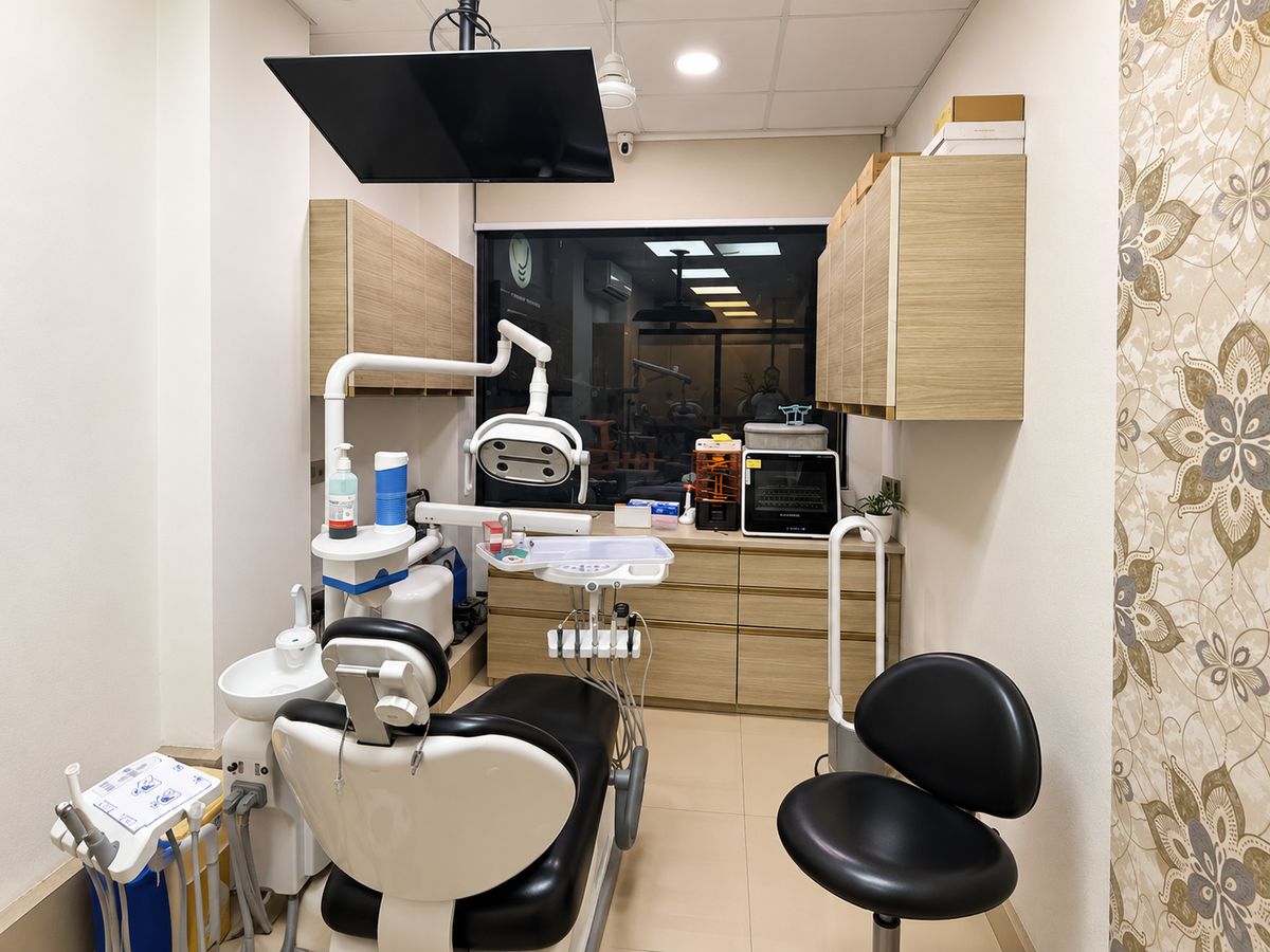 Dental treatment room with modern equipment at Dr. Pranay's Dental Clinic